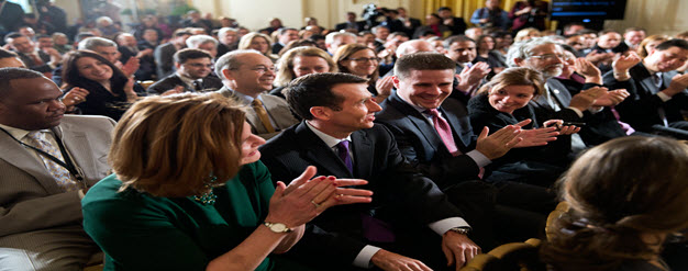 David_Plouffe,_second_from_left,_receives_applause_as_President_Barack_Obama_thanks_Plouffe_for_his_service,_2013.jpg